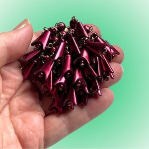 Vintage mulberry molded plastic cha-cha brooch midcentury